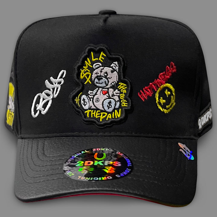Gorra OSO SMILE THE PAIN VINIPIEL