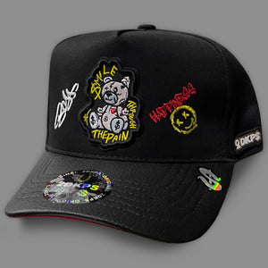 Gorra OSO SMILE THE PAIN VINIPIEL