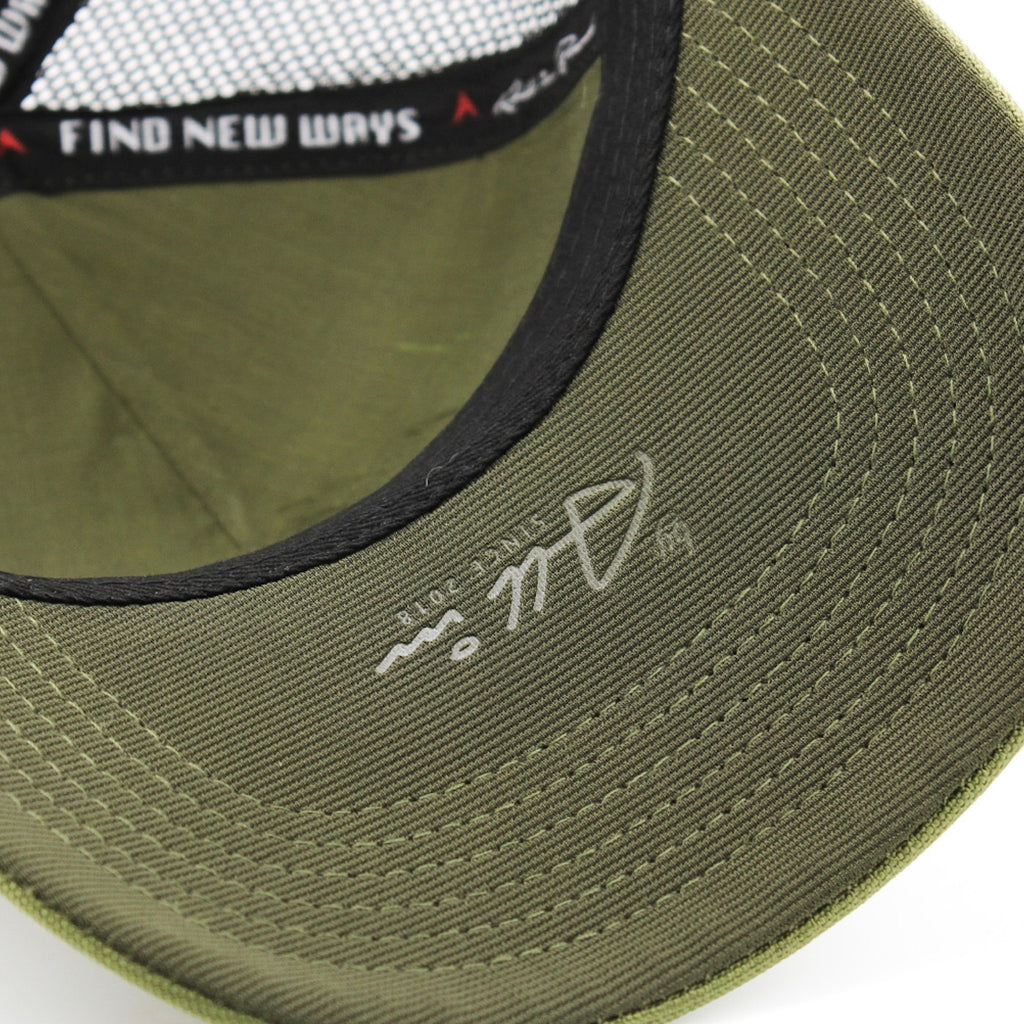 Gorra All In Horizonte Artificial Verde con negro Trucker